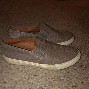 Grey slip on sneakers
